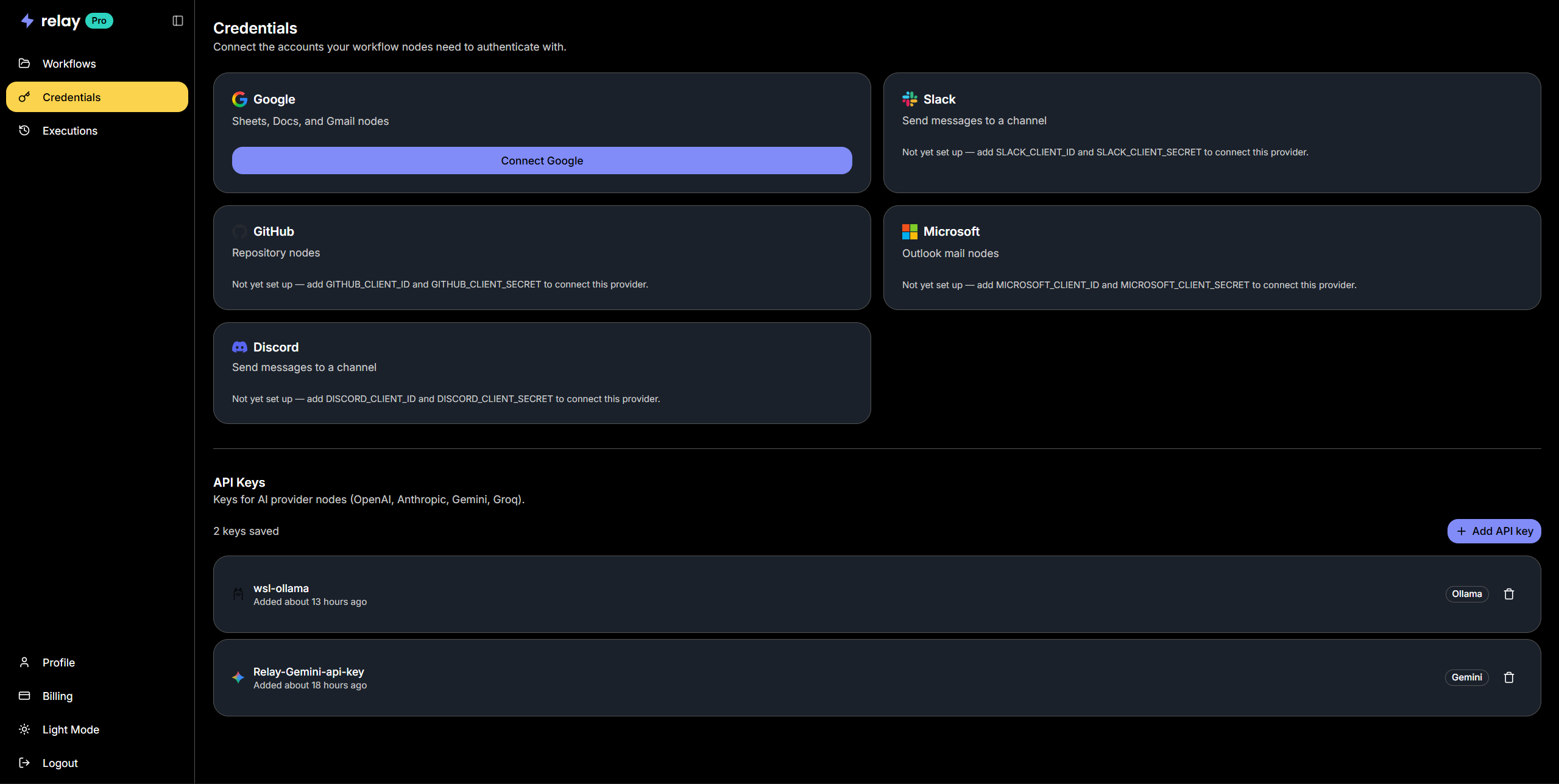 The Relay credentials page showing OAuth connection cards for Google, Slack, GitHub, Microsoft, and Discord, plus a list of two saved API keys for Ollama and Gemini